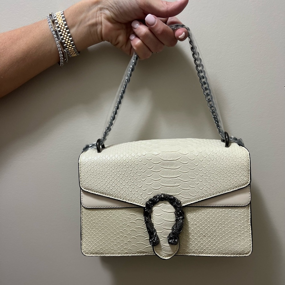 Super cute brand, new shoulder purse from a boutique near me